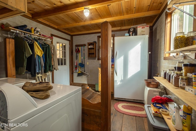 laundry room with hardwood / wood-style floors, washer / dryer, wooden ceiling, and a healthy amount of sunlight