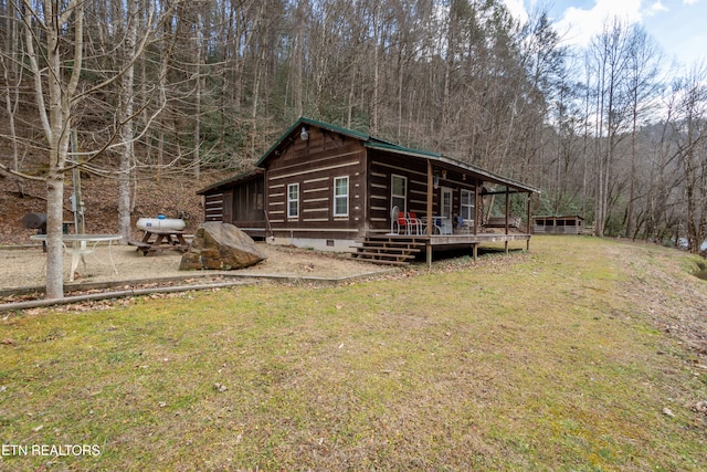 view of home's exterior featuring a yard