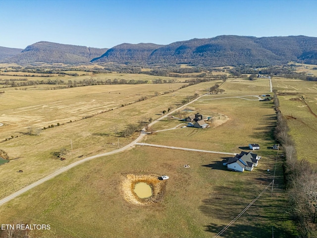 bird's eye view featuring a mountain view and a rural view