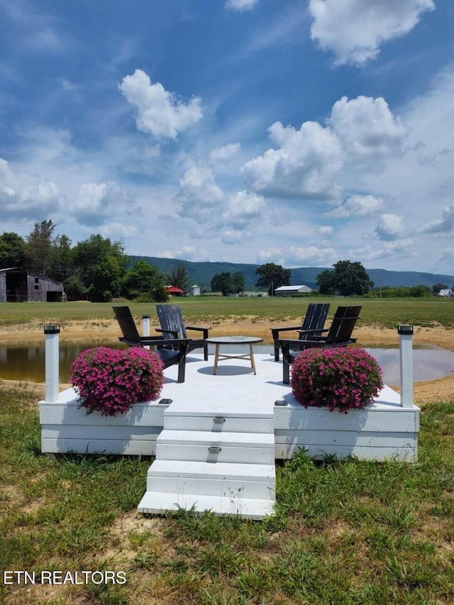 surrounding community featuring a mountain view