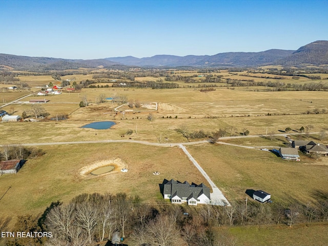 aerial view with a mountain view and a rural view