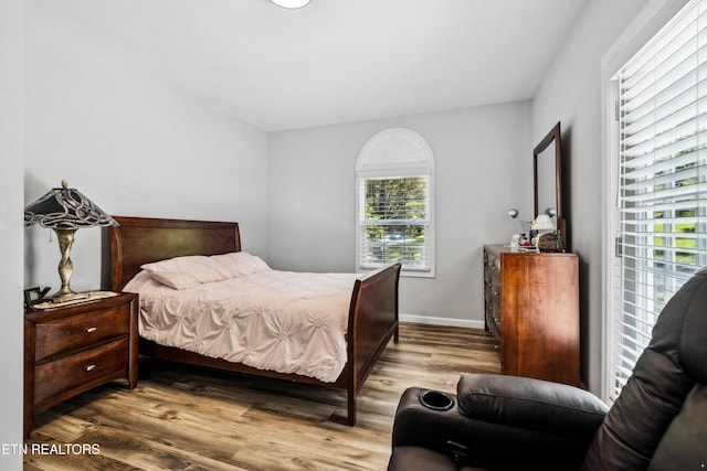 bedroom with light wood-type flooring