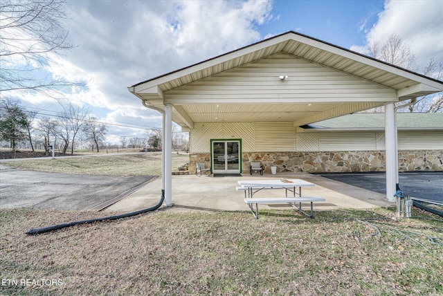 rear view of house with a patio