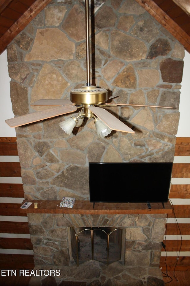 details with a fireplace and ceiling fan