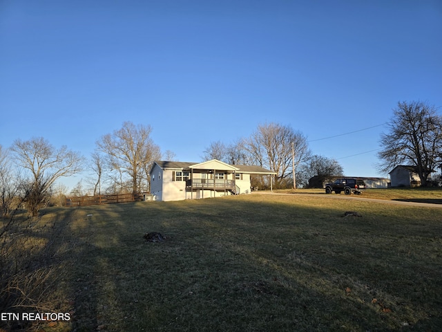 exterior space with a front yard