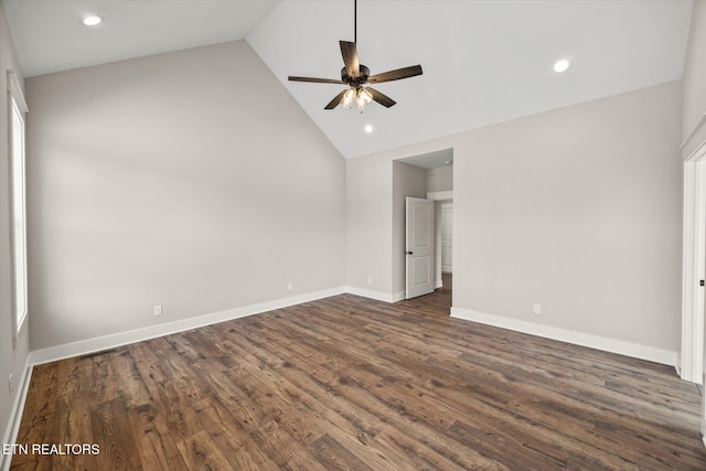 unfurnished bedroom featuring dark wood-type flooring, high vaulted ceiling, and ceiling fan