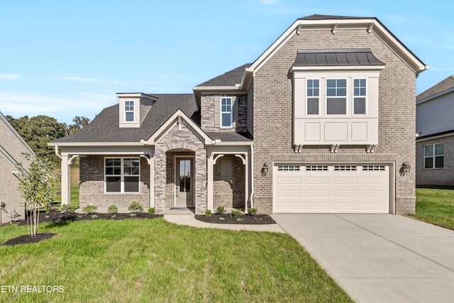 view of front facade featuring a garage and a front lawn