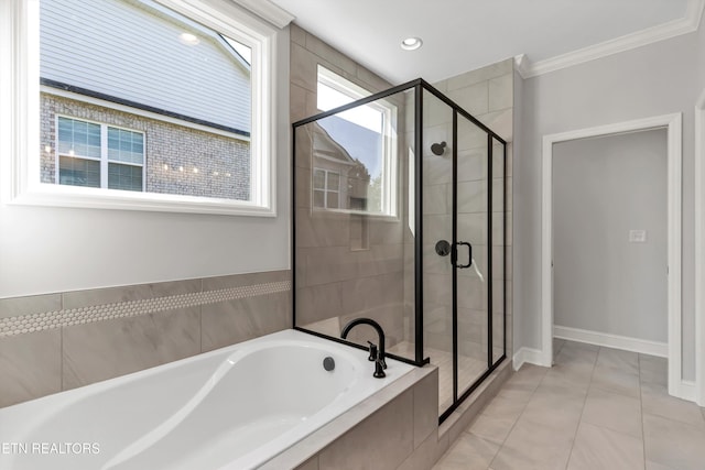 bathroom with ornamental molding, separate shower and tub, and tile patterned flooring