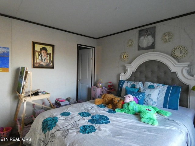 bedroom featuring crown molding