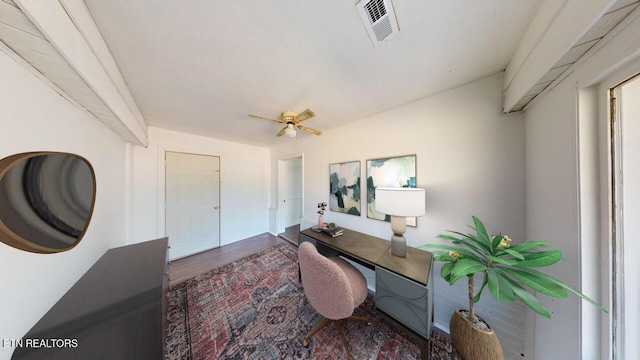 office featuring wood-type flooring and ceiling fan