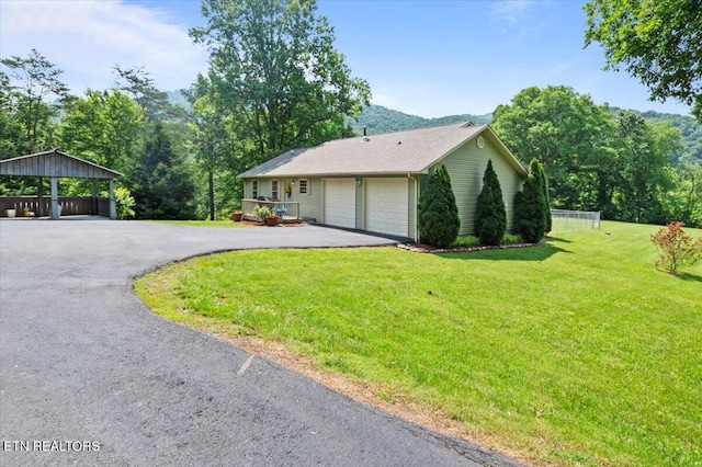 142 Wagon Wheel Ln, Pioneer, TN 37847 - view of home's exterior with a yard and asphalt driveway