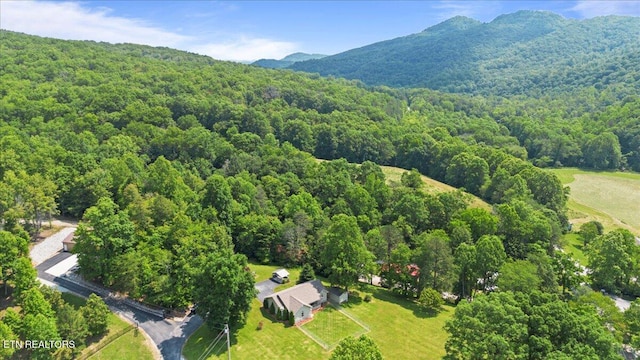 142 Wagon Wheel Ln, Pioneer, TN 37847 - aerial view of property and surrounding area featuring a forest and mountains