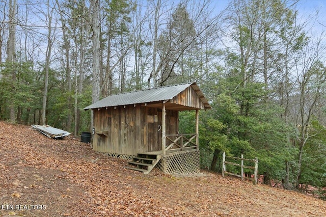 142 Wagon Wheel Ln, Pioneer, TN 37847 - view of outdoor structure featuring a wooded view