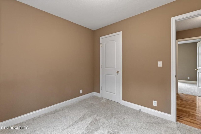 142 Wagon Wheel Ln, Pioneer, TN 37847 - unfurnished bedroom with light carpet and baseboards