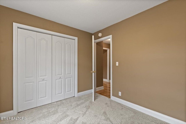 142 Wagon Wheel Ln, Pioneer, TN 37847 - unfurnished bedroom with light colored carpet and a closet
