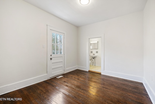 112 E Inskip Dr, Knoxville, TN 37912 - unfurnished room featuring dark wood-type flooring and baseboards