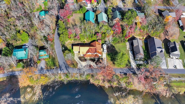 drone / aerial view with a water view