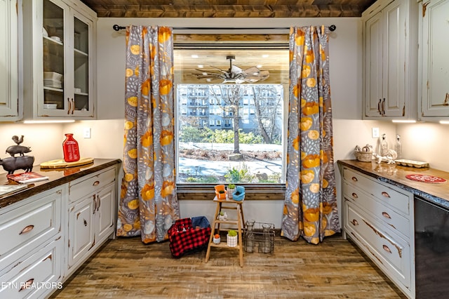 kitchen featuring white cabinetry and hardwood / wood-style flooring