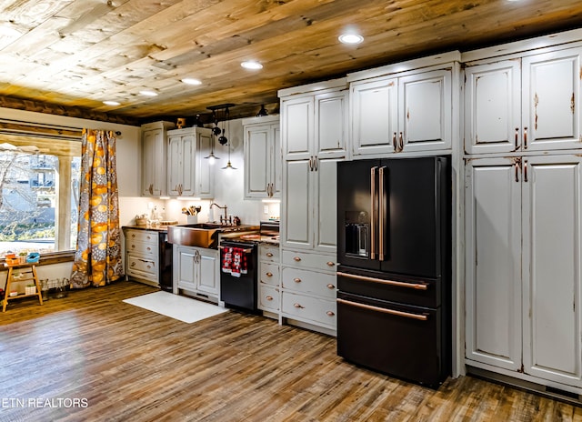 kitchen with white cabinets, high quality fridge, hardwood / wood-style flooring, and wooden ceiling