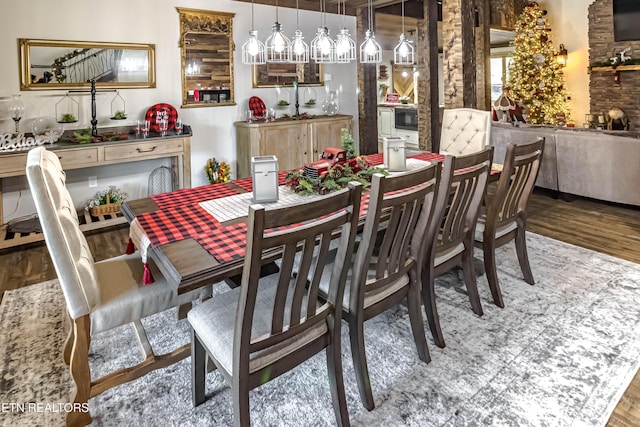 dining space featuring dark hardwood / wood-style floors