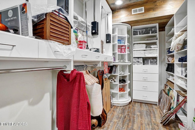 spacious closet featuring hardwood / wood-style floors