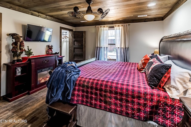 bedroom with wood-type flooring and wooden ceiling