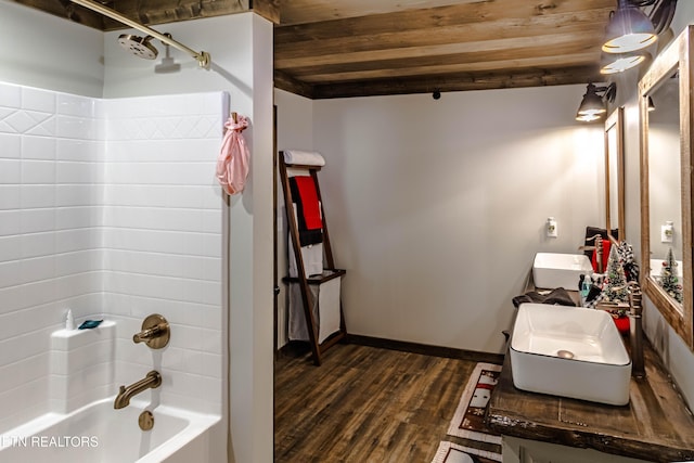 bathroom with hardwood / wood-style flooring, shower / tub combination, vanity, and wood ceiling