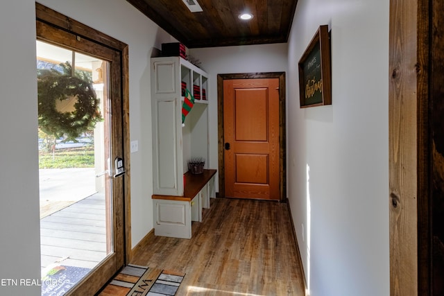 mudroom with wood-type flooring and wooden ceiling