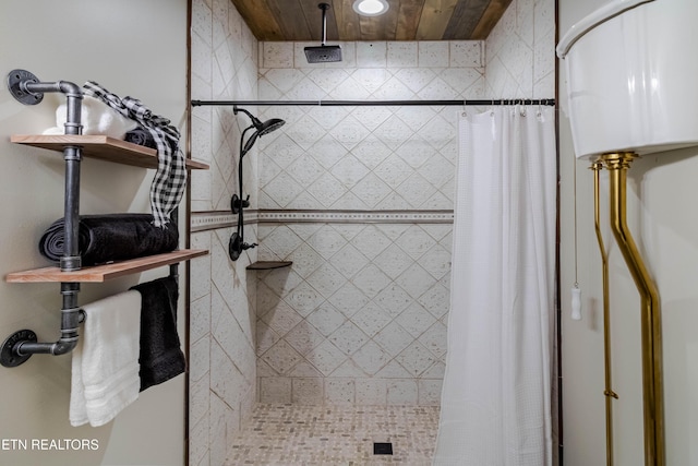 bathroom with curtained shower