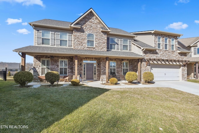 view of front facade featuring an attached garage, roof with shingles, driveway, and a front lawn