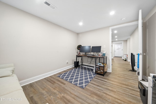 office with wood-type flooring