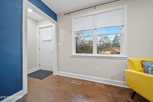 foyer entrance with hardwood / wood-style floors