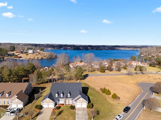 bird's eye view with a water view