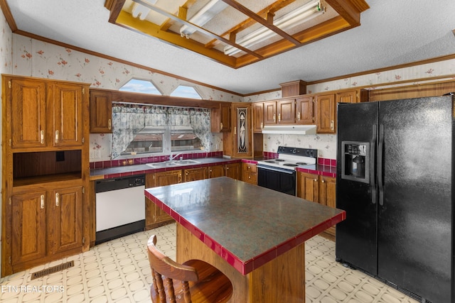 kitchen featuring ornamental molding, a center island, sink, and white appliances