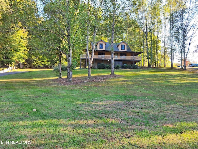 view of yard with a deck