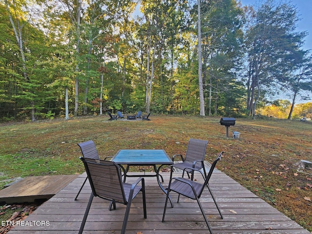 deck featuring a fire pit