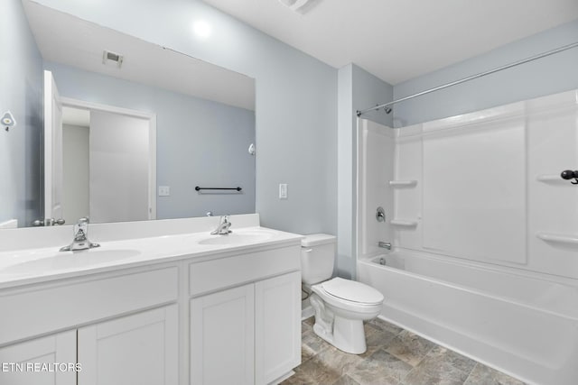 full bathroom featuring vanity, toilet, and shower / bathing tub combination