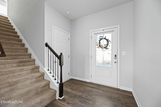 entryway featuring dark wood-type flooring