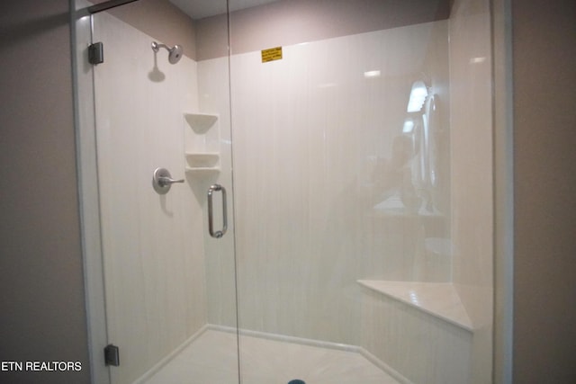 bathroom featuring walk in shower