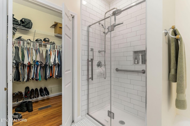 bathroom with an enclosed shower