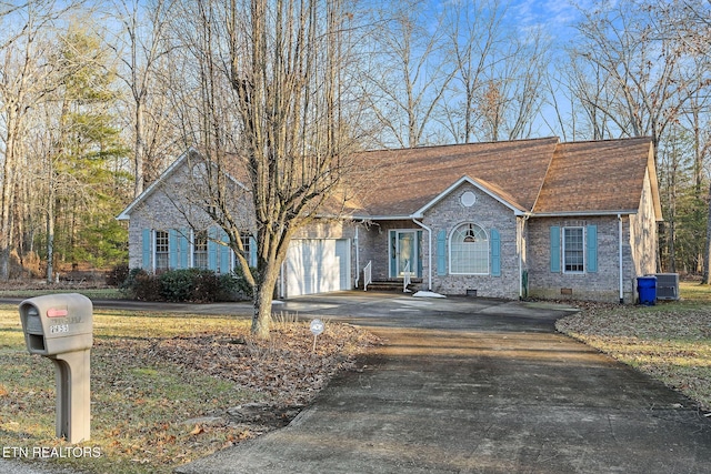 ranch-style home with a garage