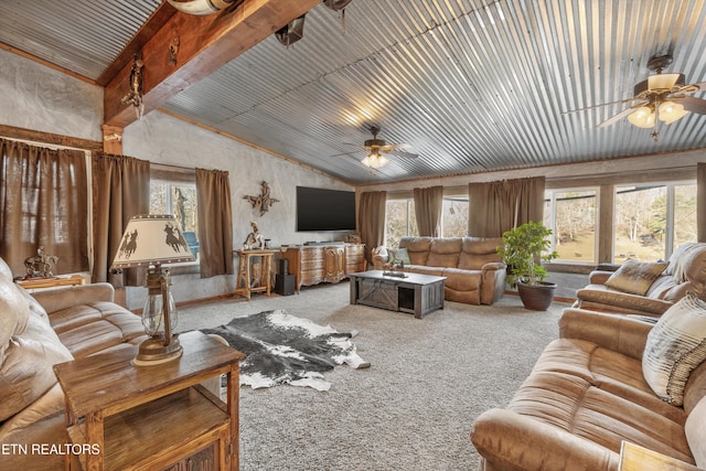 living room featuring lofted ceiling, ceiling fan, and carpet flooring