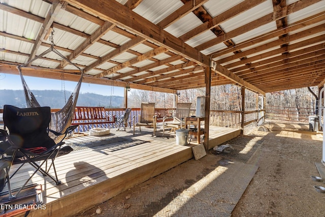 wooden terrace with a mountain view