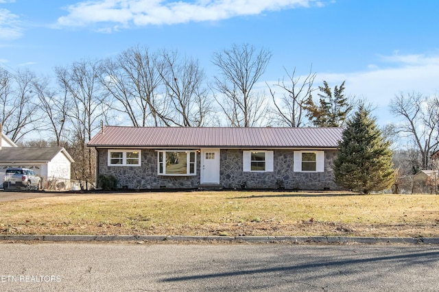 ranch-style house with a front lawn