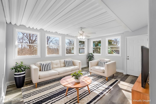 sunroom with a wealth of natural light and ceiling fan