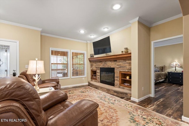 living room with ornamental molding, a stone fireplace, and dark hardwood / wood-style flooring