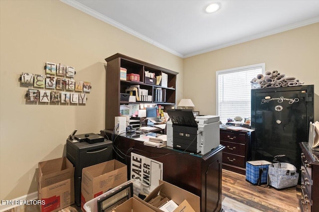 home office featuring crown molding and light hardwood / wood-style flooring