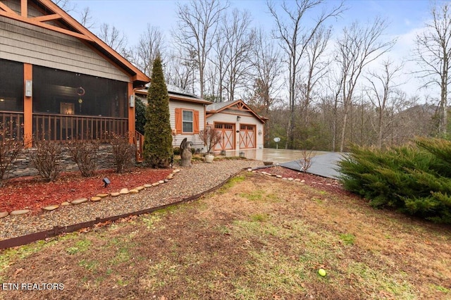 view of yard with a garage