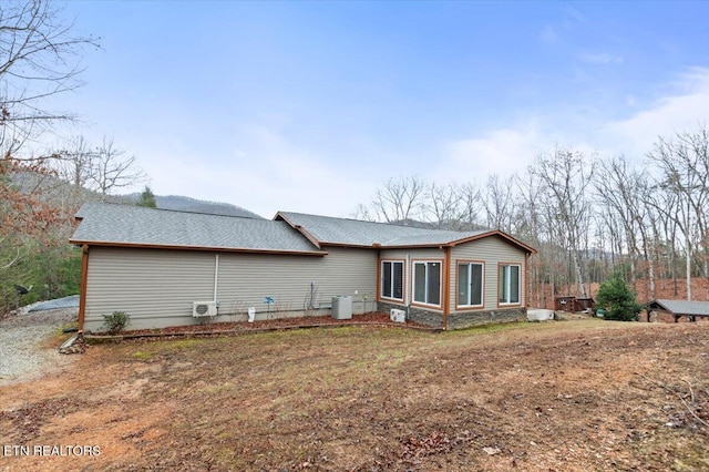 view of property exterior featuring central AC