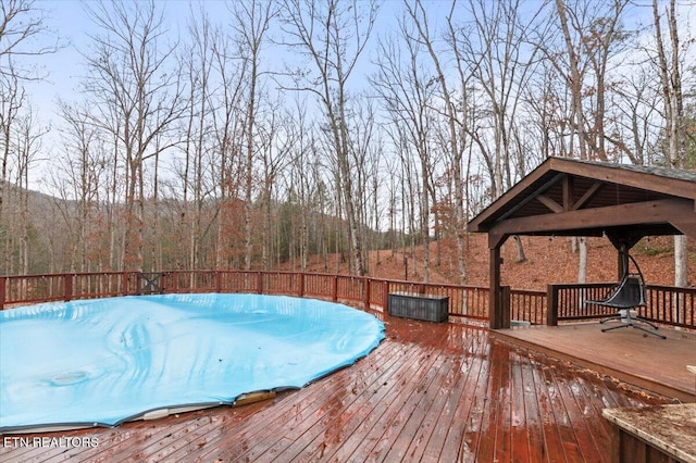 wooden deck with a gazebo